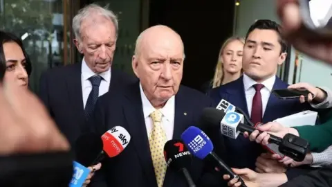 Sexual Assault Accusations Against Leading Down Under Broadcaster Lessened